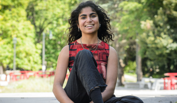 Jaya Sinha sits among the greenery on campus