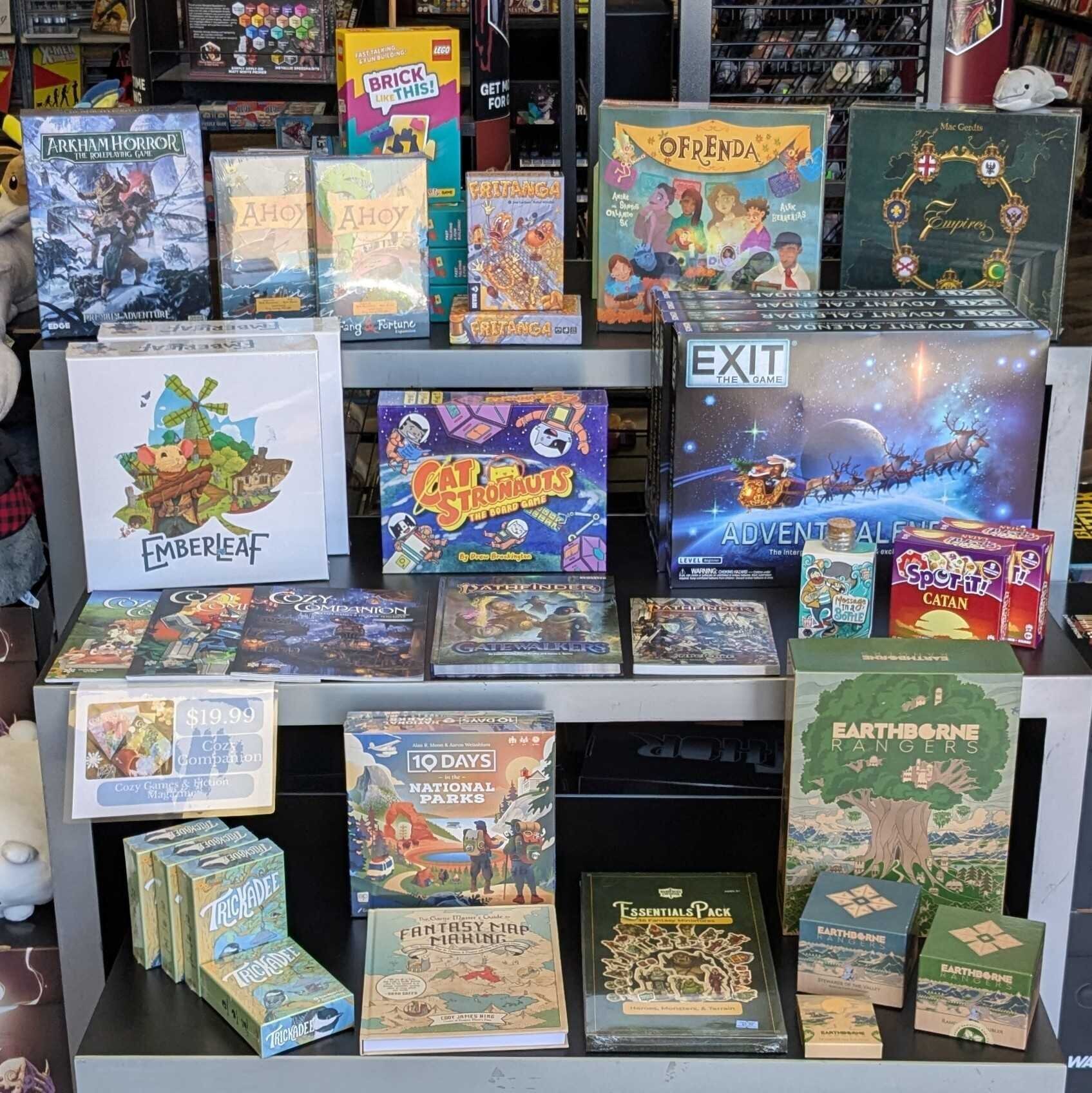 Table display of new board games and tabletop roleplay game books