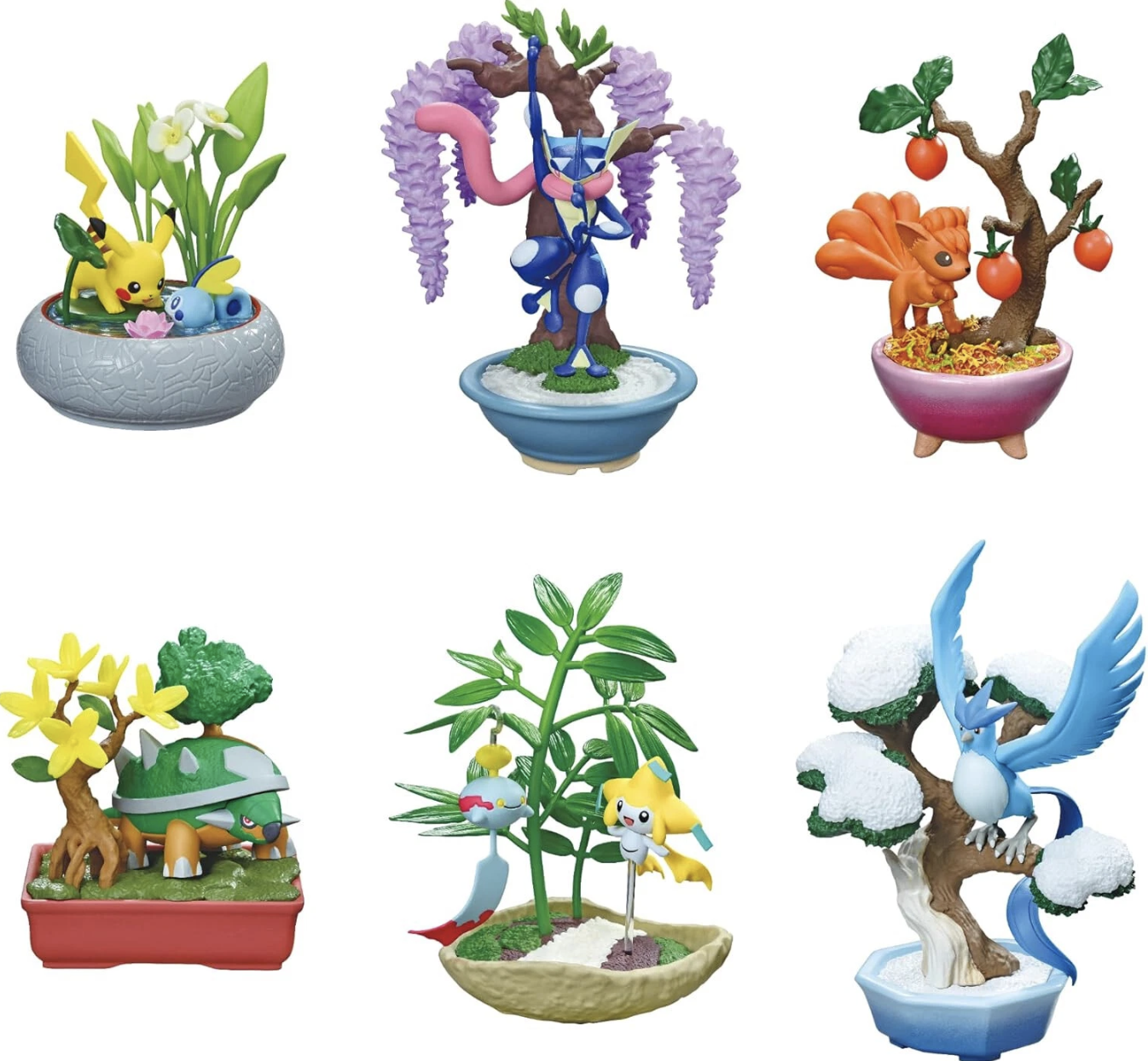 Image of small plants that are toys with a pokemon in each