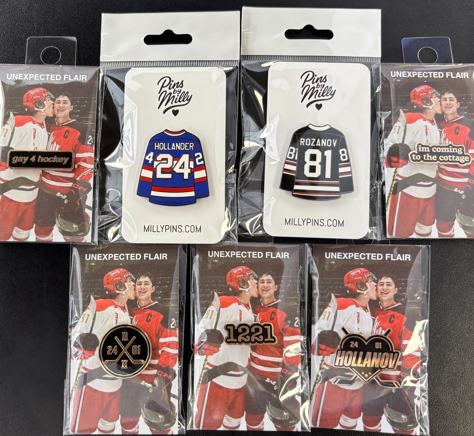 Heated Rivalry enamel pin display