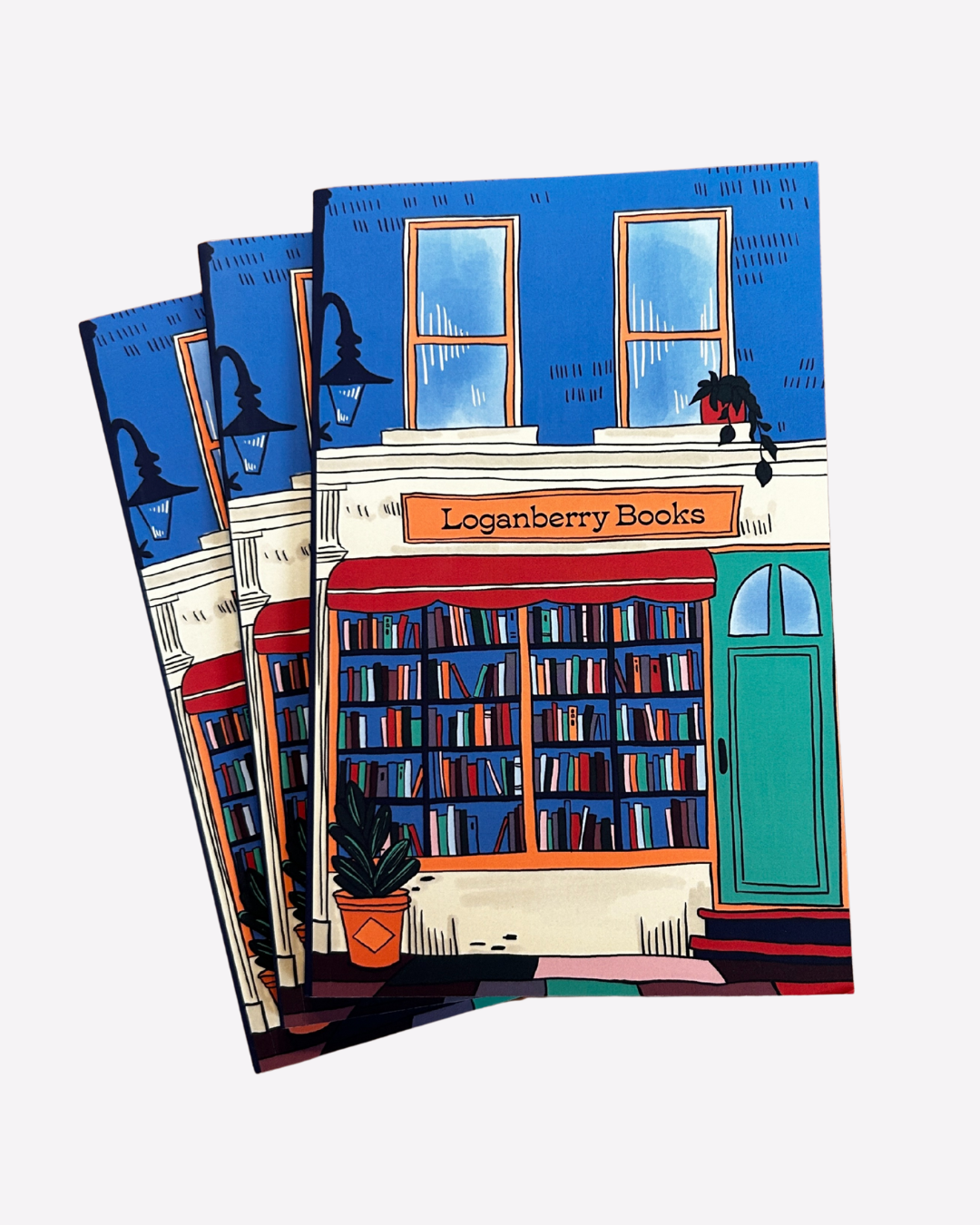Softcover notebook with illustration of bookshop on cover