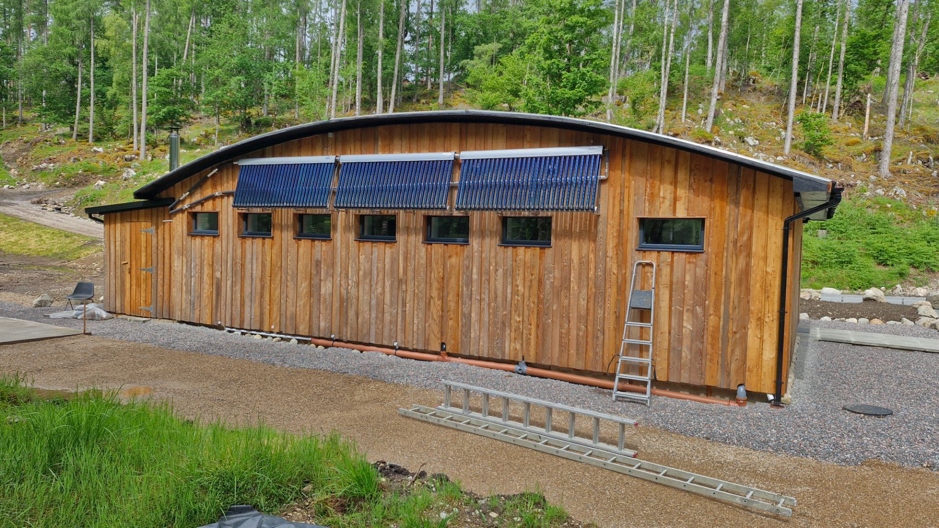 The amienity building now named Am Fasgadh, with solar panels fitted.