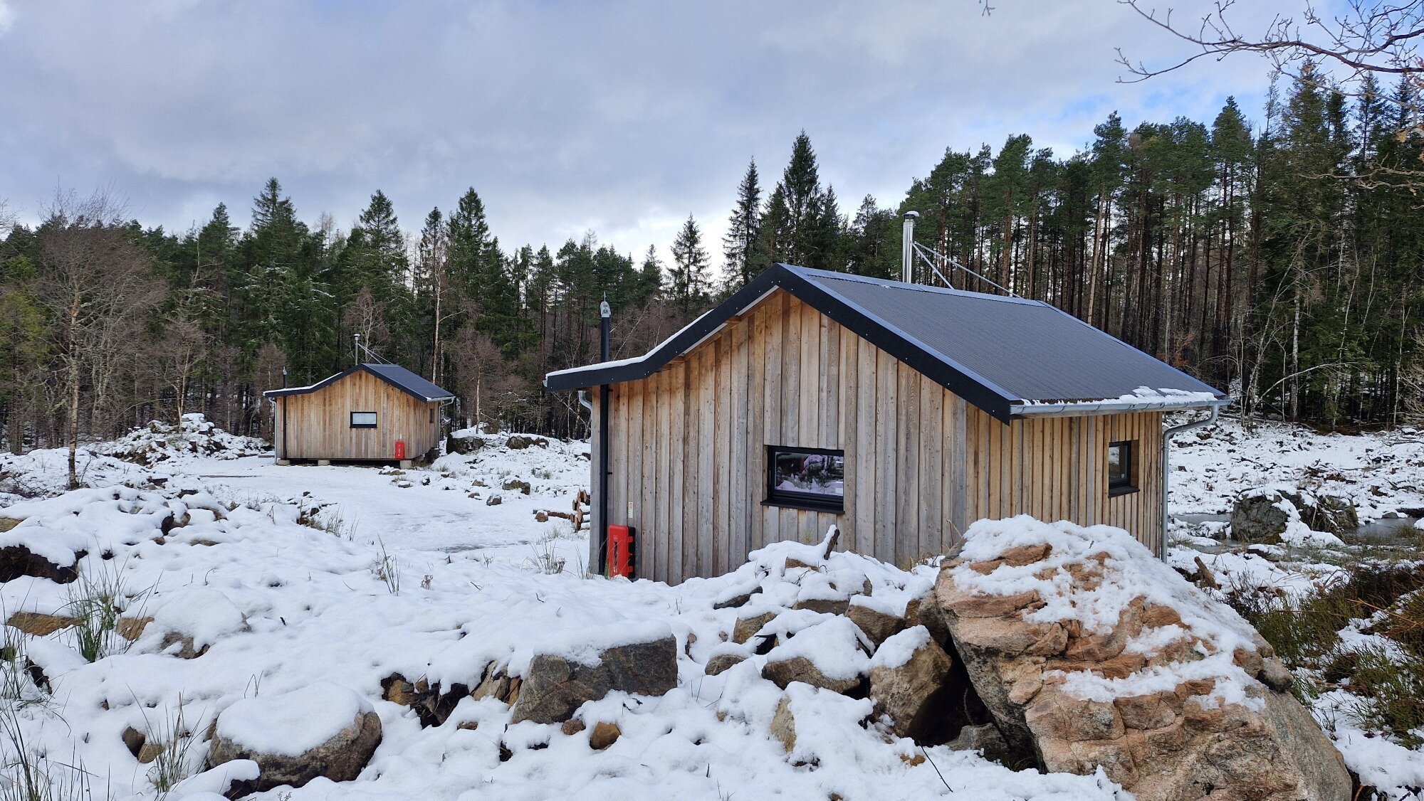 Two of the cabins photographed during the snowy Easter weekend.