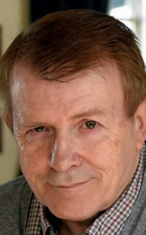 Headshot of author Tony Bassett