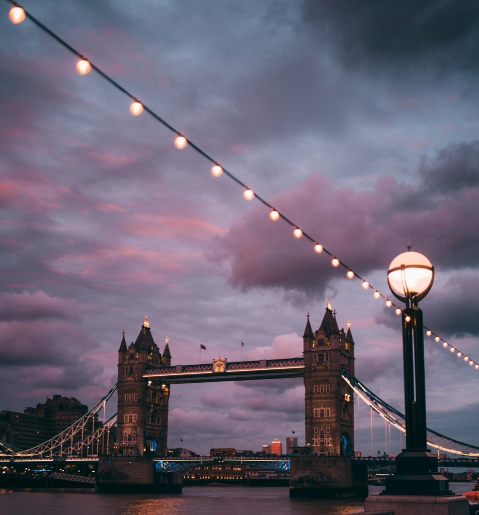 The Tower Bridge in London against a moody grey sky