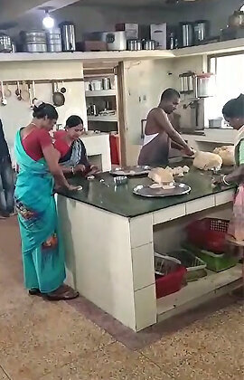 Our cooks working hard to prepare lunch