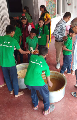 Serving the celebratory lunch