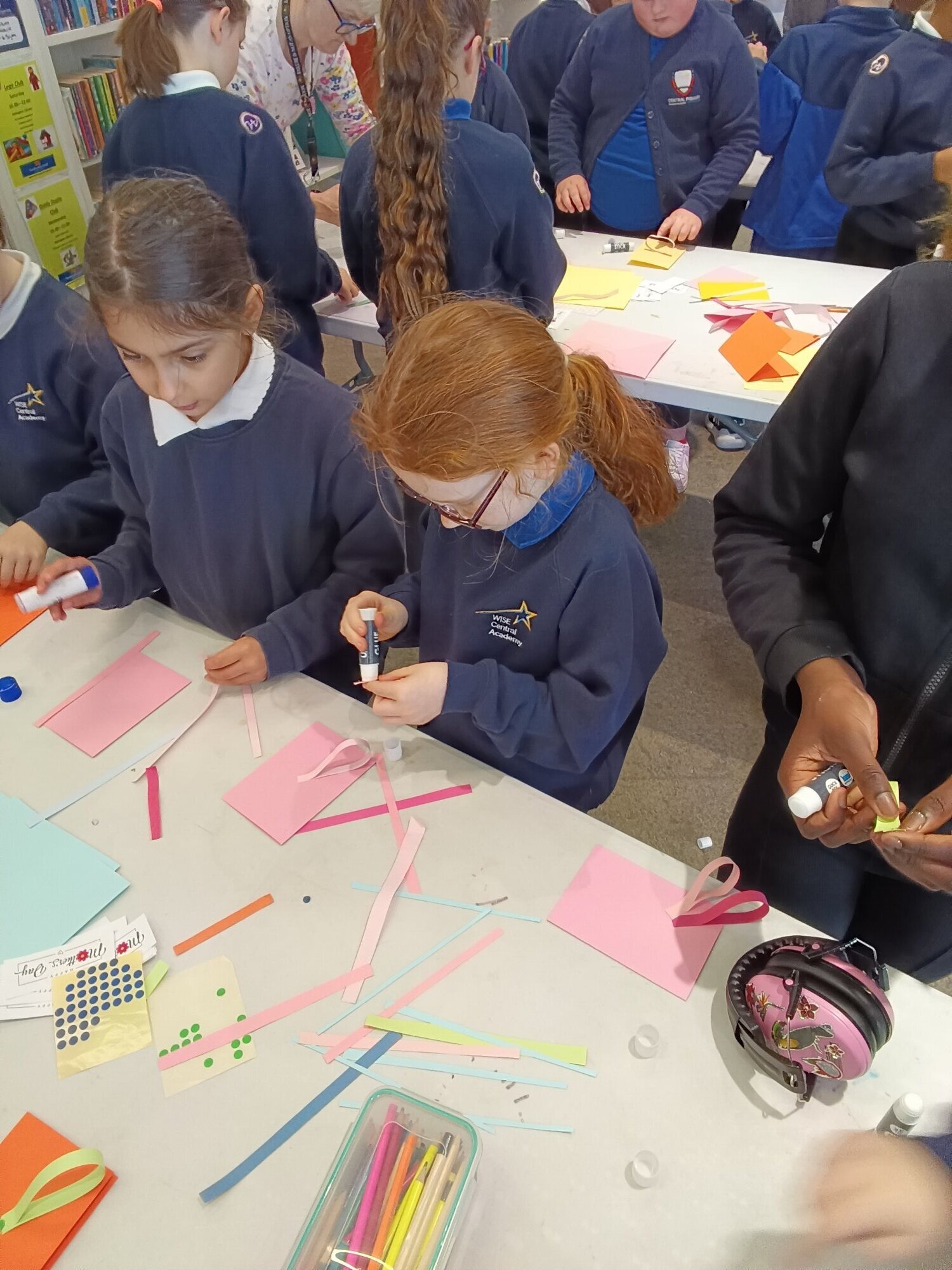 Year 4 children making Mother's Day cards at Ashington Library.