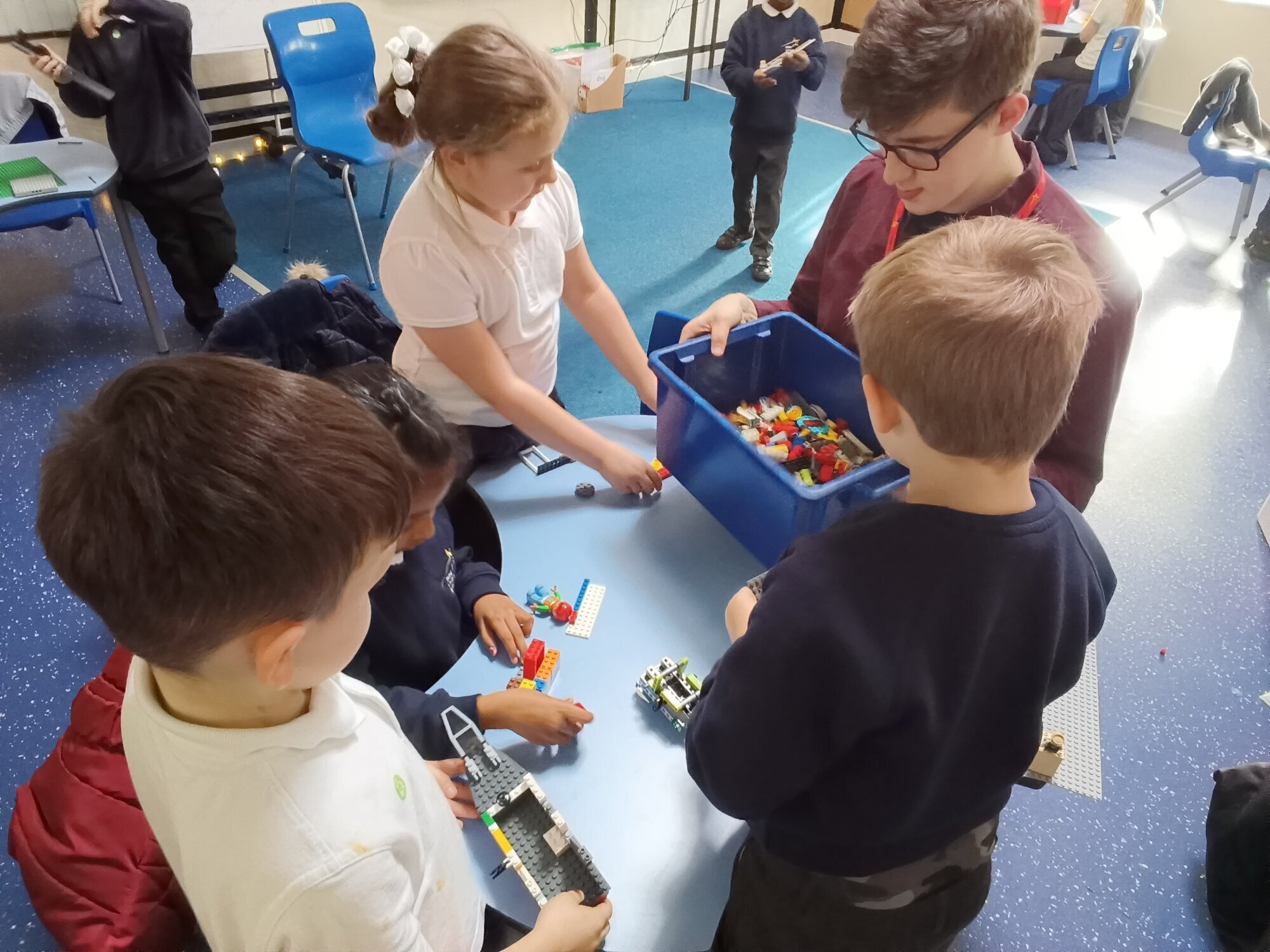 Year 2 children building Lego