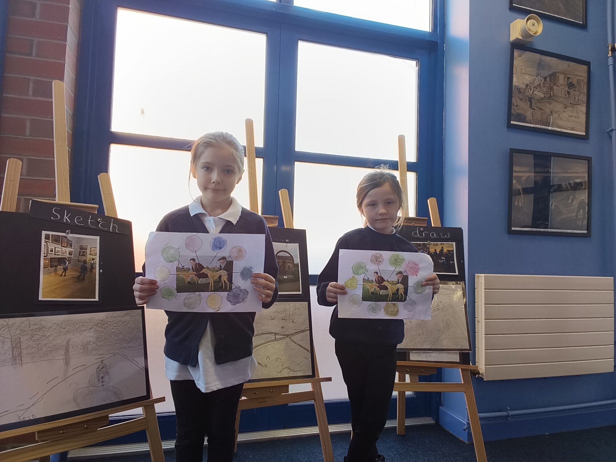 Six girls with their winning certificates.